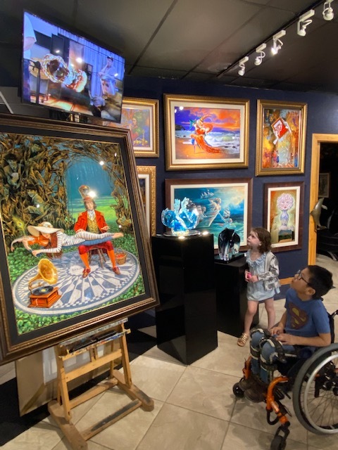 children watching video in art gallery
