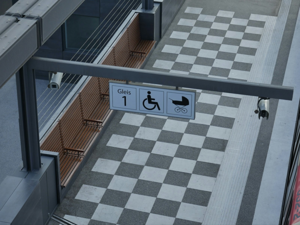 wheelchair access sign on gate
https://unsplash.com/photos/a-sign-on-a-building-Q5svyiNybM8?utm_content=creditShareLink&utm_medium=referral&utm_source=unsplash