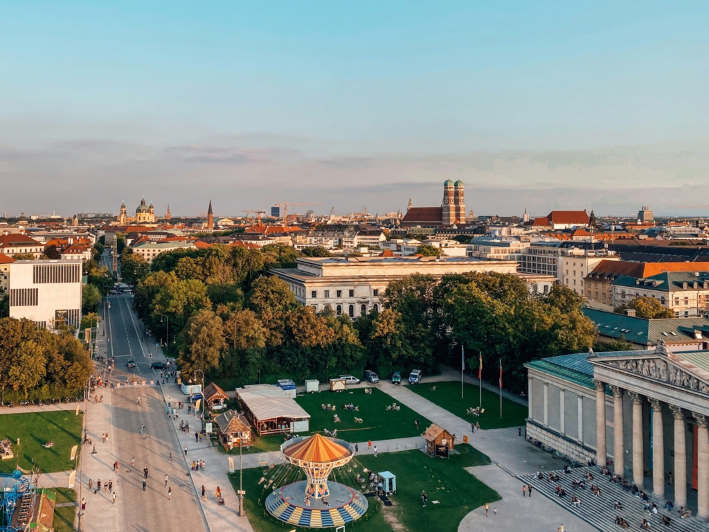 View of Munich from a tall building.
https://unsplash.com/photos/aerial-view-of-green-and-brown-basketball-court-during-daytime-O3OIWMYbGQU?utm_content=creditShareLink&utm_medium=referral&utm_source=unsplash