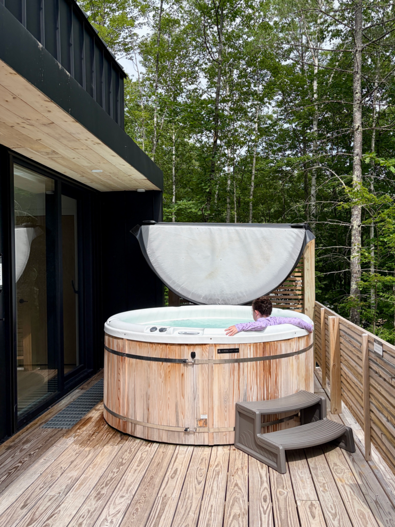 hot tub on deck by forest